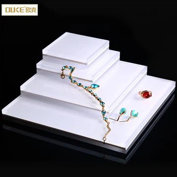white acrylic boxes